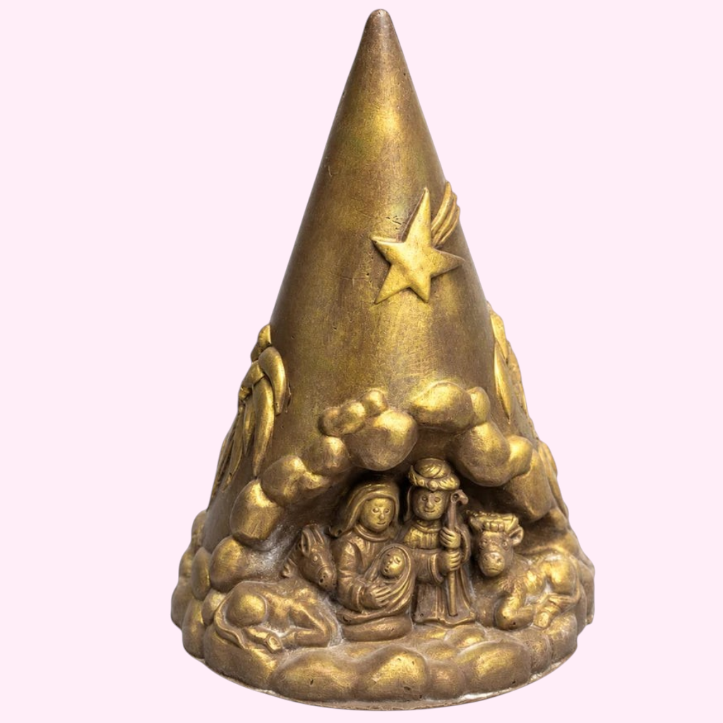 Rear view of a gold chocolate Christmas cone with Nativity decorations