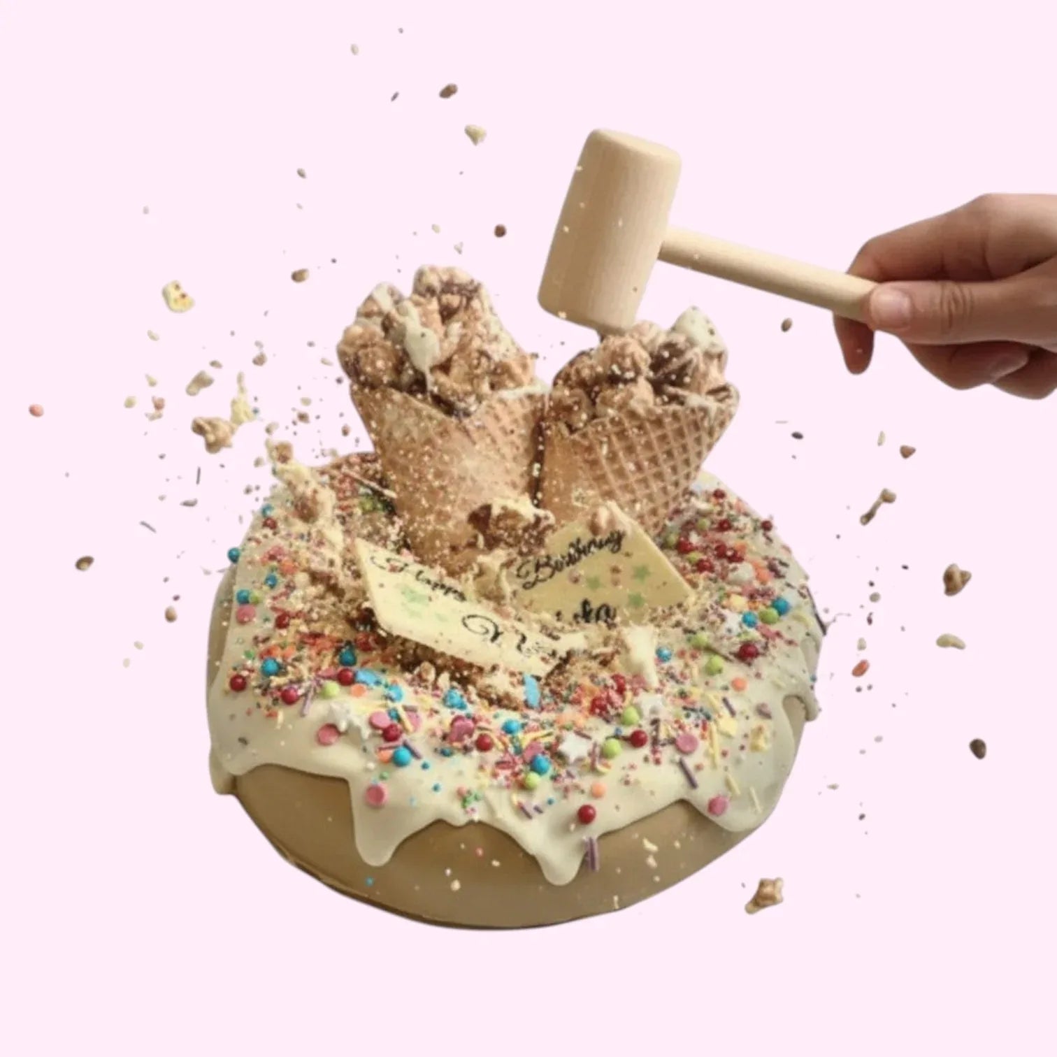 Sweet Snap Sydney chocolate donut smash cake with white chocolate plaque, sprinkles, and popcorn cones.