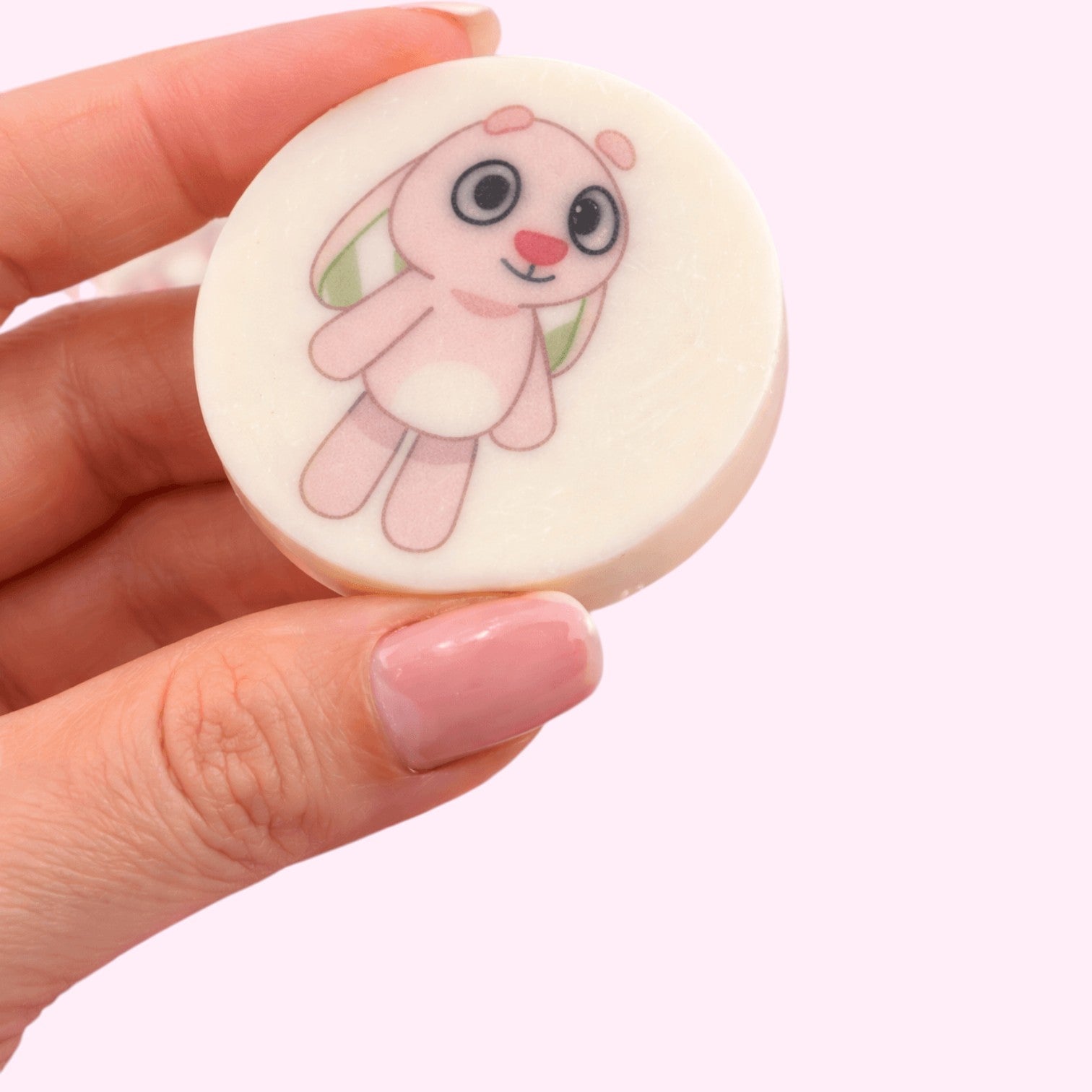 Sweet Snap Sydney customisable white chocolate discs featuring a cute pink bunny illustration. Perfect for personalised gifts.