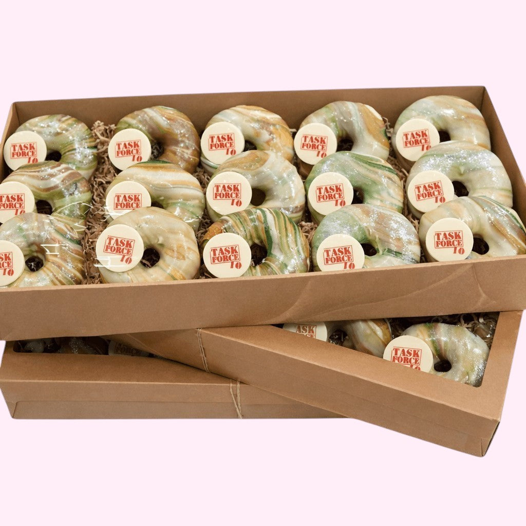 Sweet Snap Sydney customised donuts with marbled green and white icing and 'TASK FORCE 10' chocolate discs.
