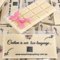 Sweet Snap Sydney white chocolate bar with custom illustration and pink ribbon, perfect for corporate gifting.